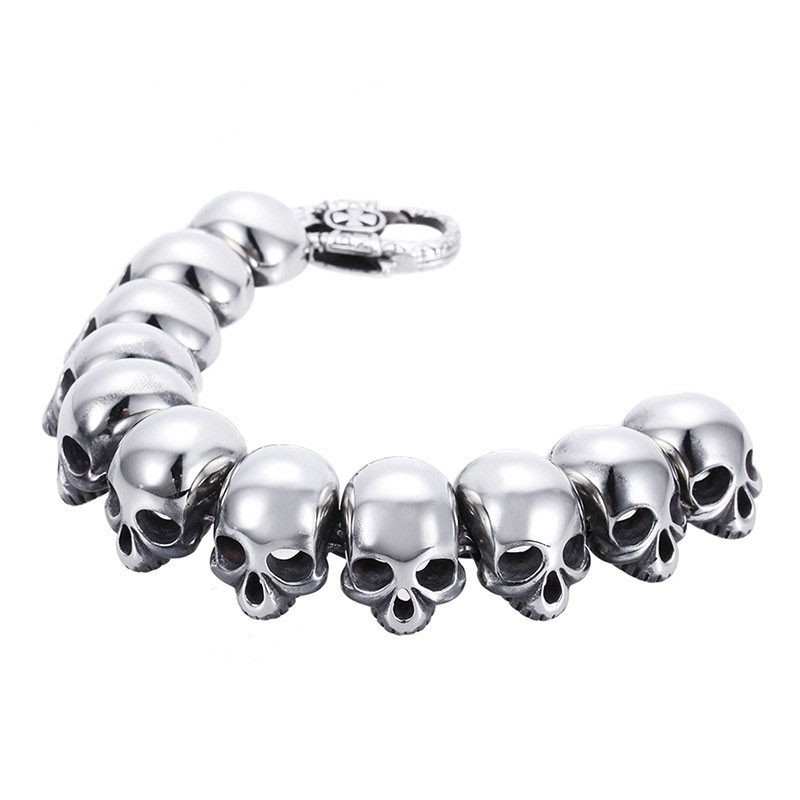 Modieuze Gepolijste Titanium Herenarmband Met Schedel En Gekruiste Beenderen Modieuze Gepolijste Titanium Herenarmband Met Schedel En Gekruiste Beenderen